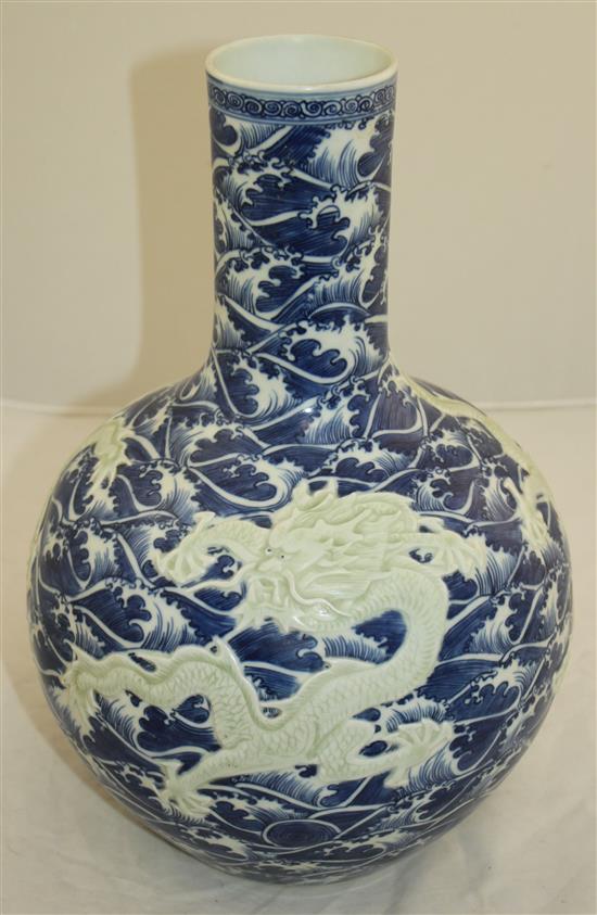 A Chinese blue and white dragon vase, 34cm